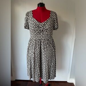 Black and white Torrid super soft mini twist front skater dress.